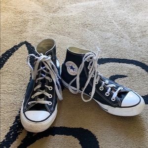 Black and white high top converse